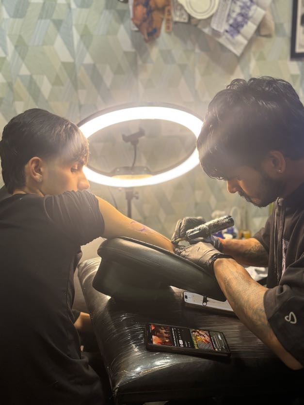 Fine line tattoo