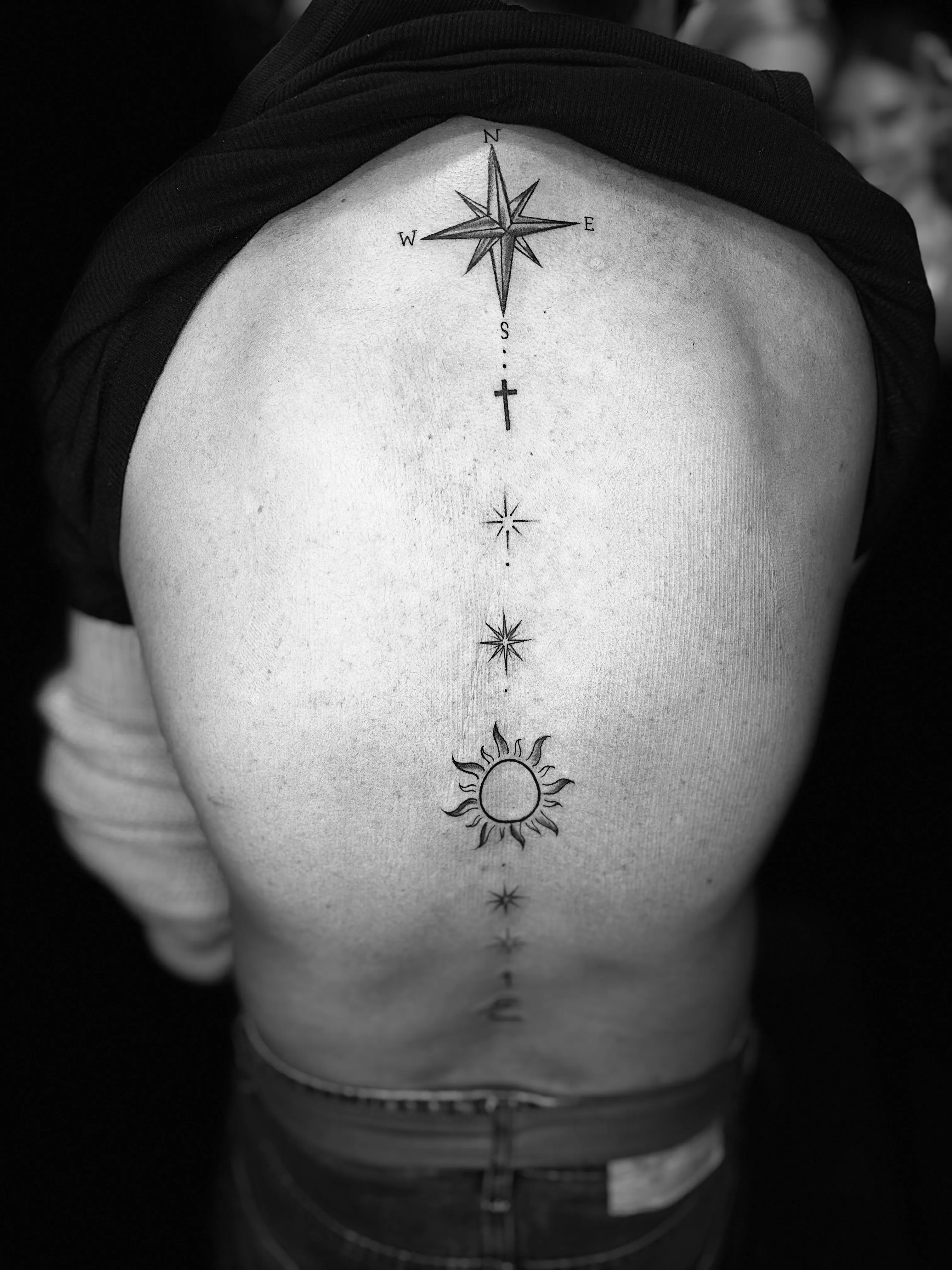 Celestial neck tattoo